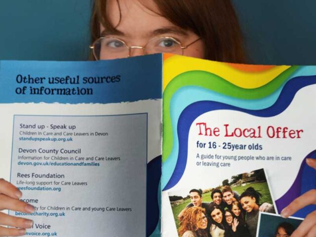 Care leaver reading information about the local offer for 16-25-year-olds