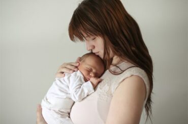 woman holding baby