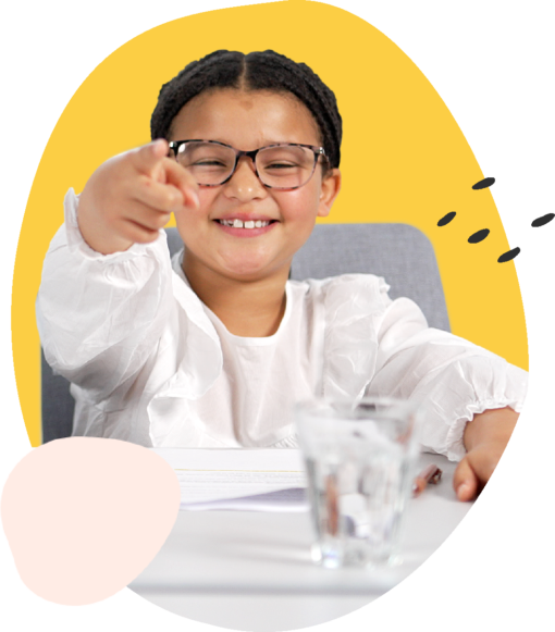 Young girl smiles and points, you're hired!