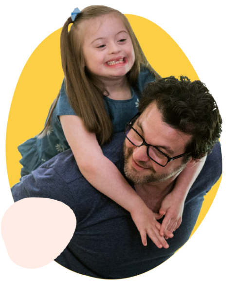 man giving a child a piggyback