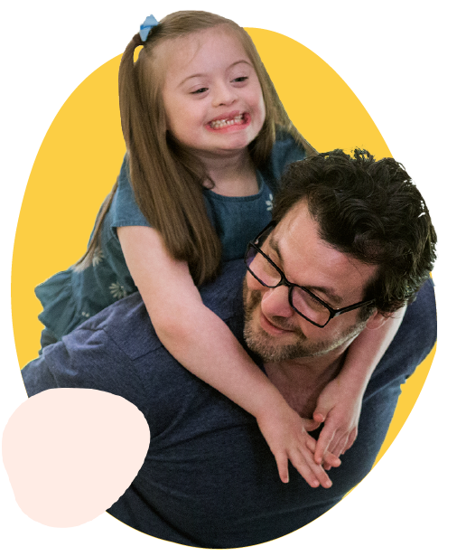 man giving a child a piggyback